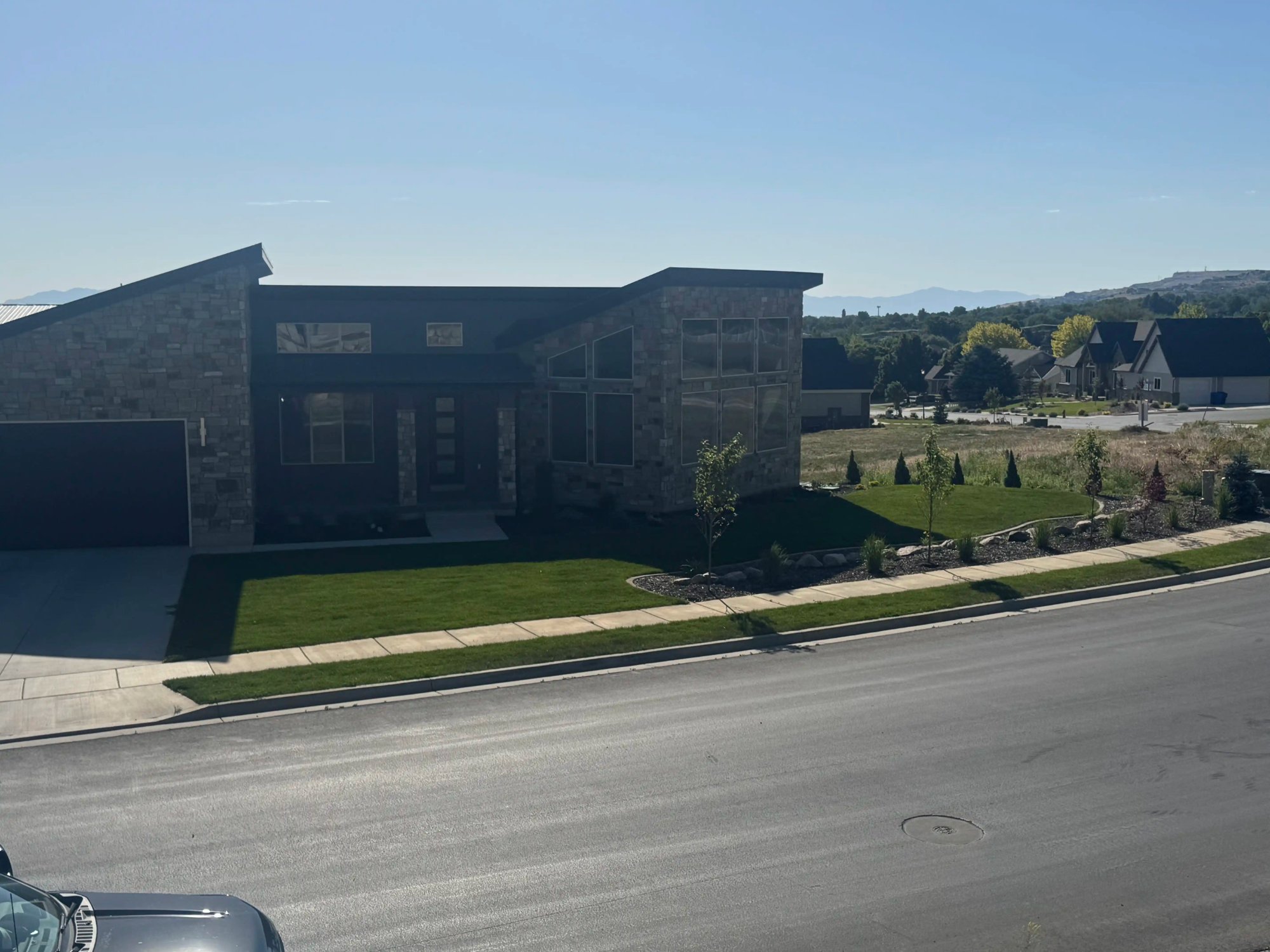 Professional front yard landscape design with modern home styling in Northern Utah by EC Landscaping in Mantua Utah