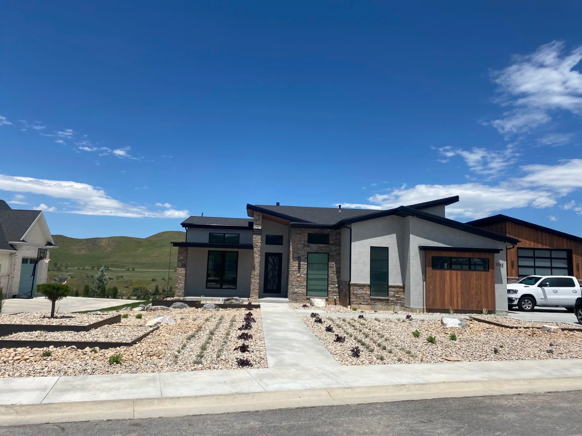 Low water xeriscaping design for modern homes by EC Landscaping in North Salt Lake Utah