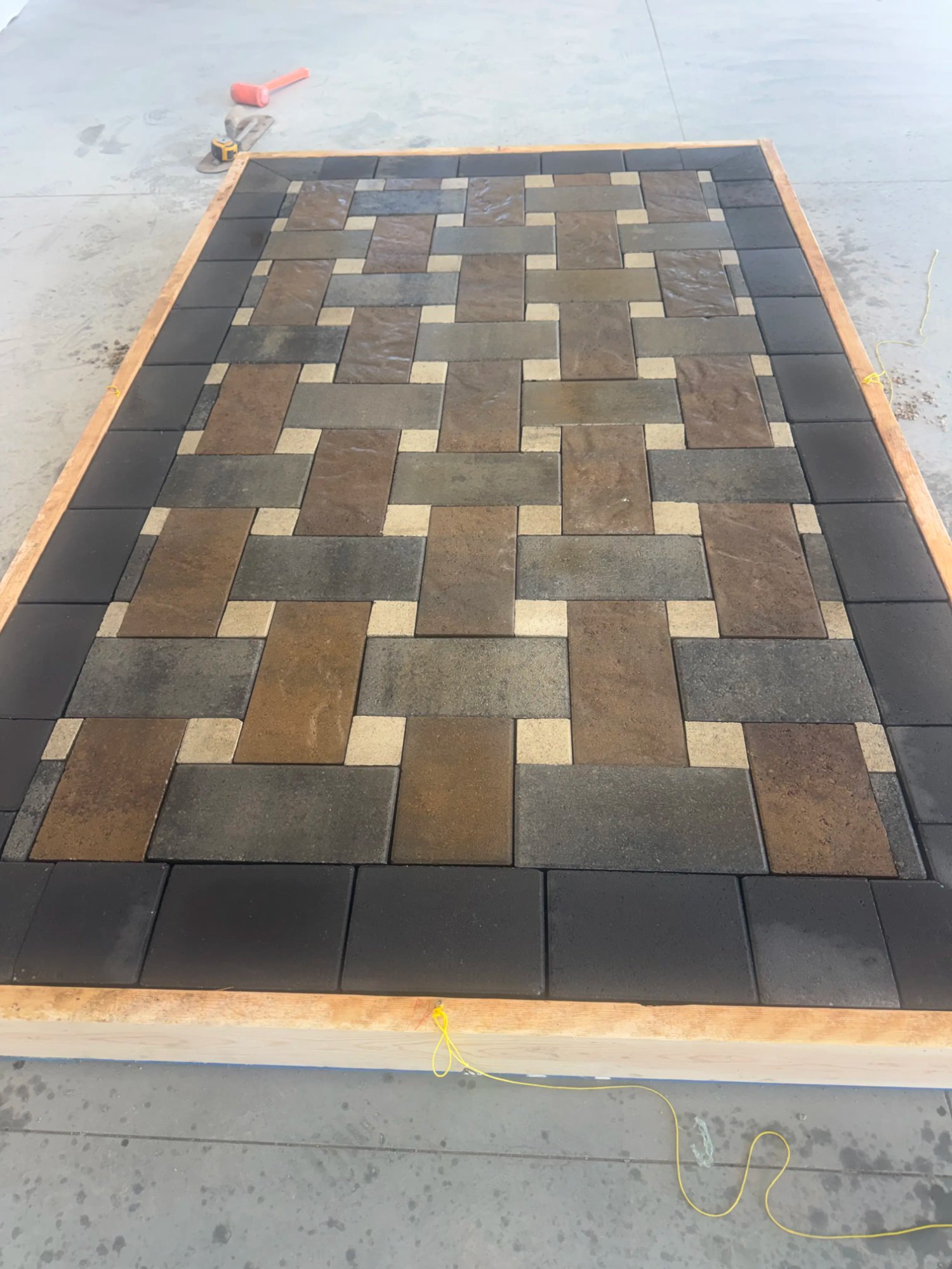 Basket weave multicolor paver patio design and installation by EC Landscaping in Mantua Utah