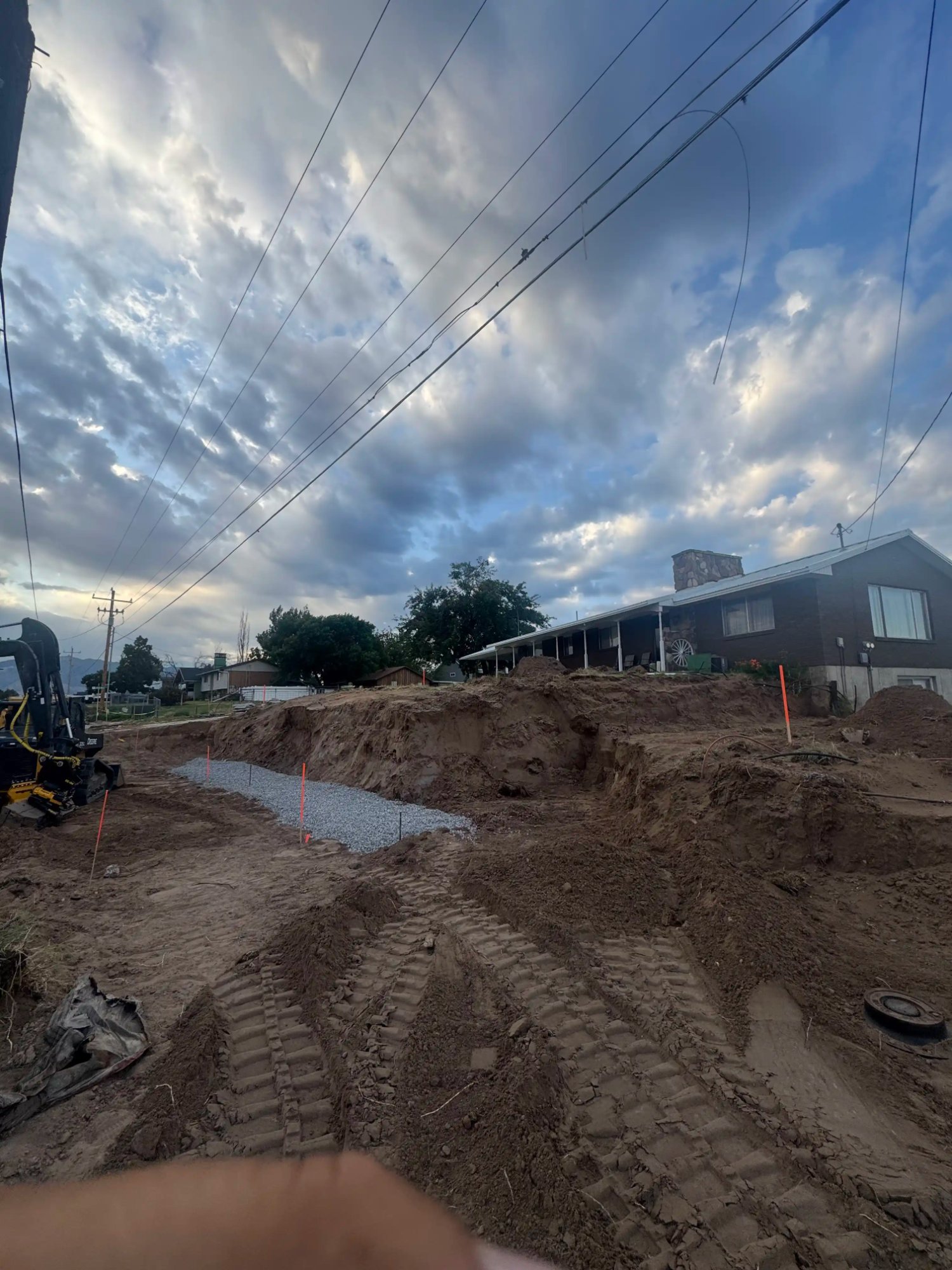 Professional site excavation and gravel base preparation for hardscape by EC Landscaping in Mantua Utah