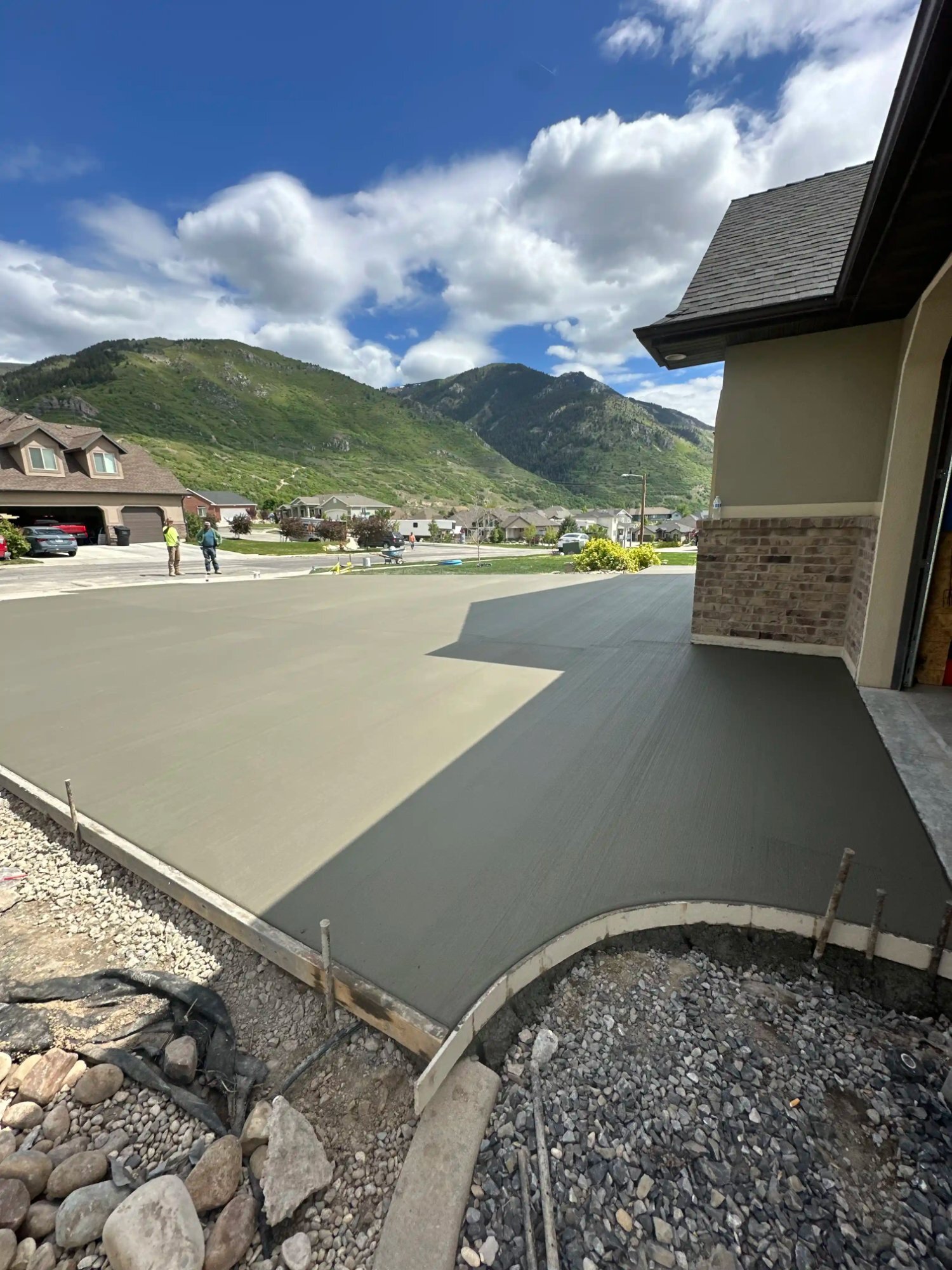 Concrete driveway pour with mountain backdrop