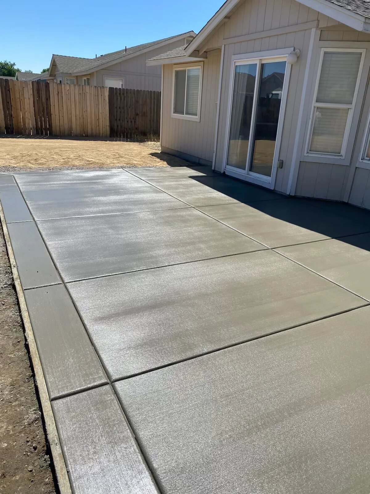 Large finished concrete slab backyard Utah