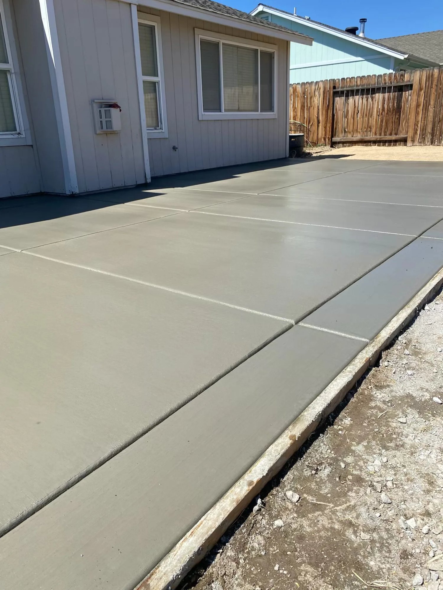 Finished broom-finish concrete patio
