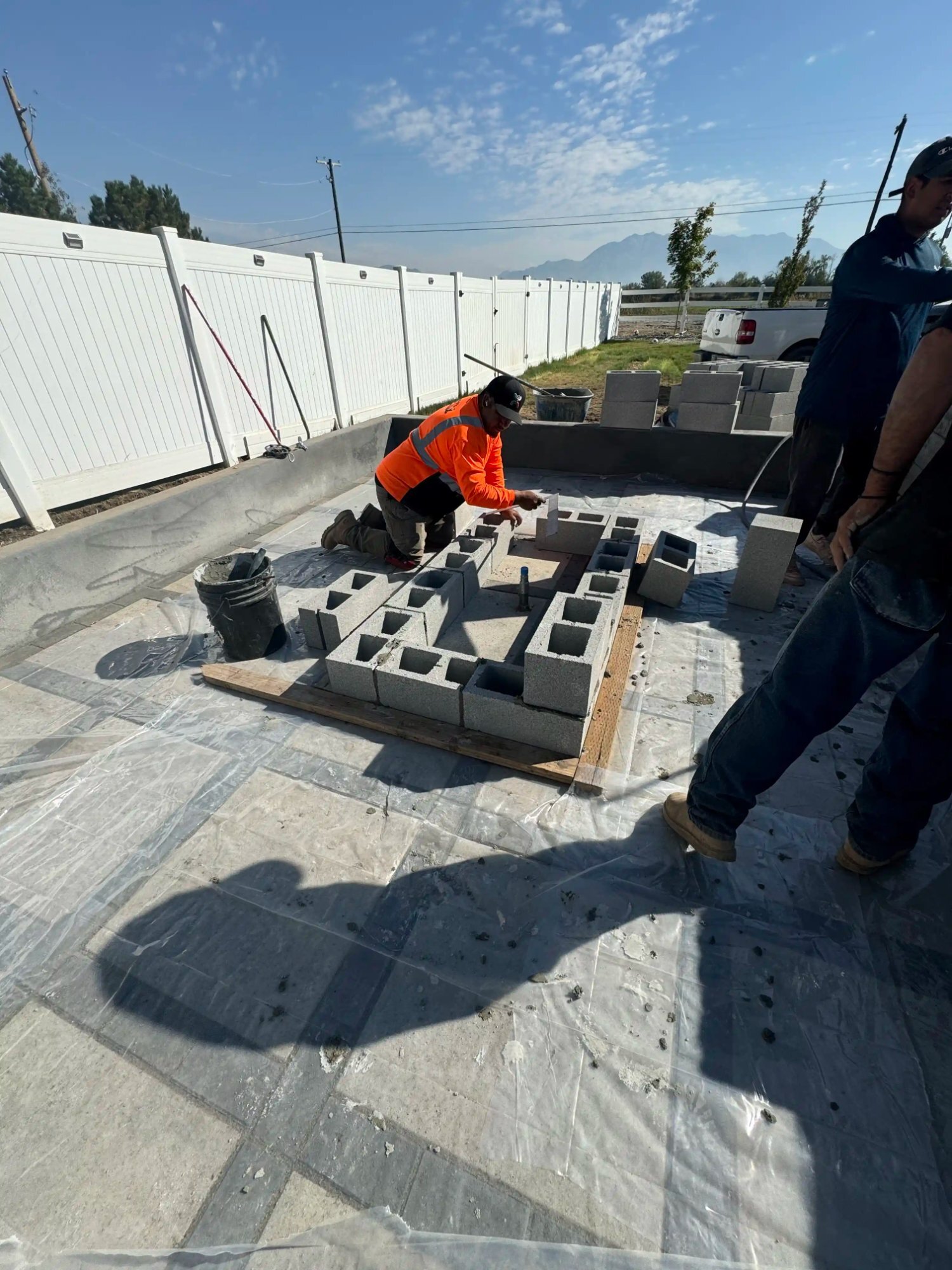 CMU block retaining wall construction crew Utah