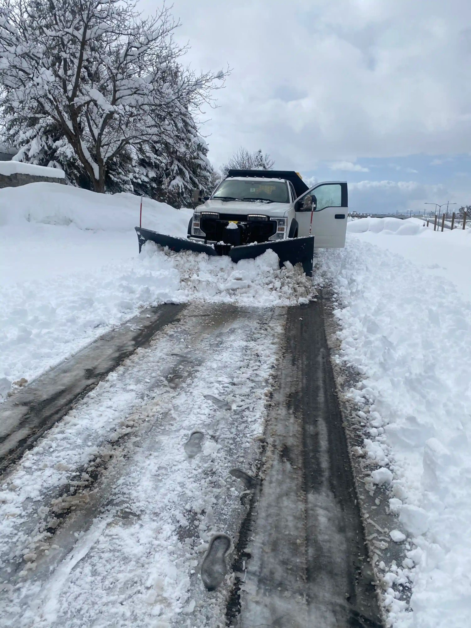Plow truck head on snow removal Utah