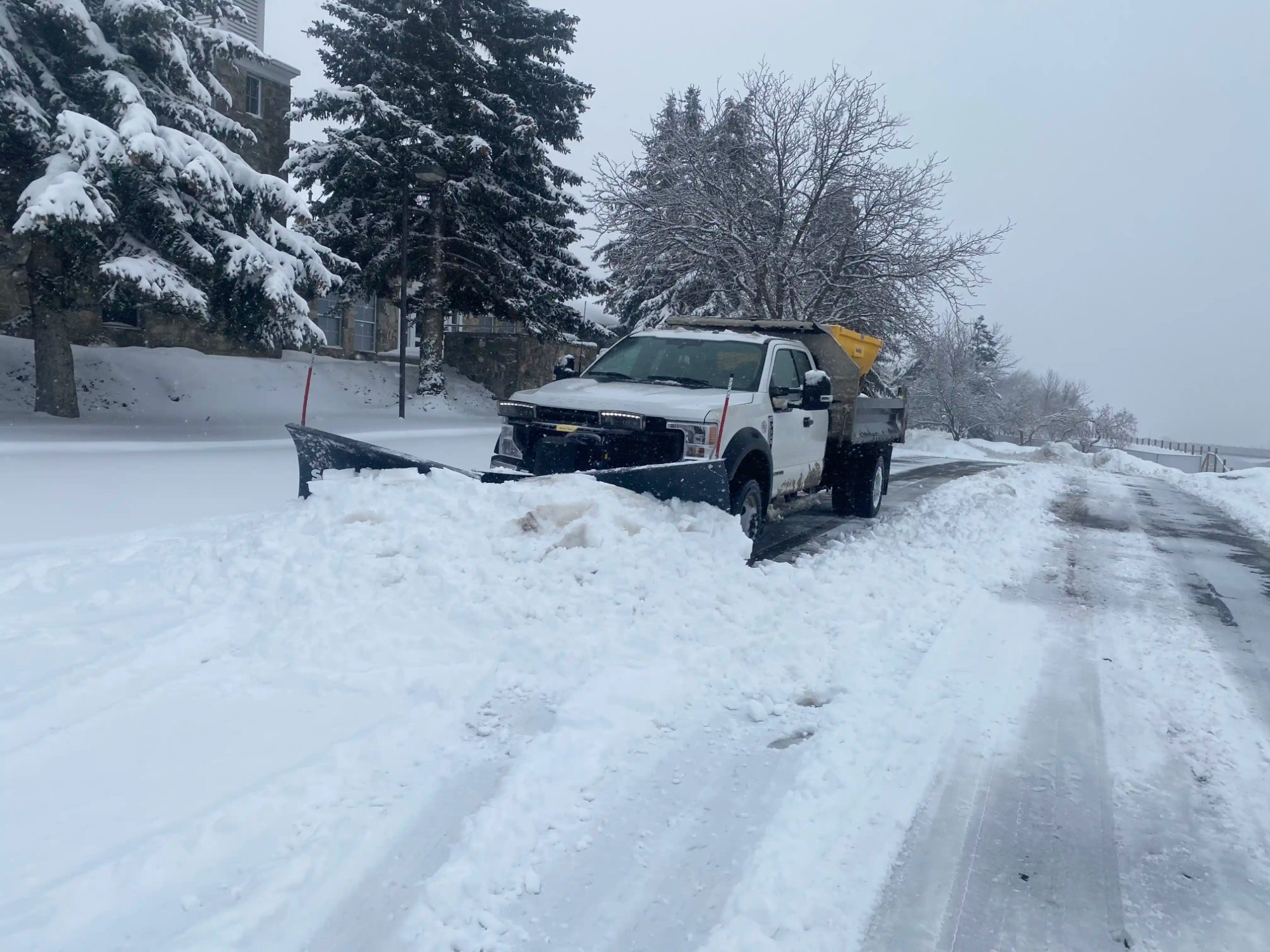 Plow truck road snow removal Northern Utah